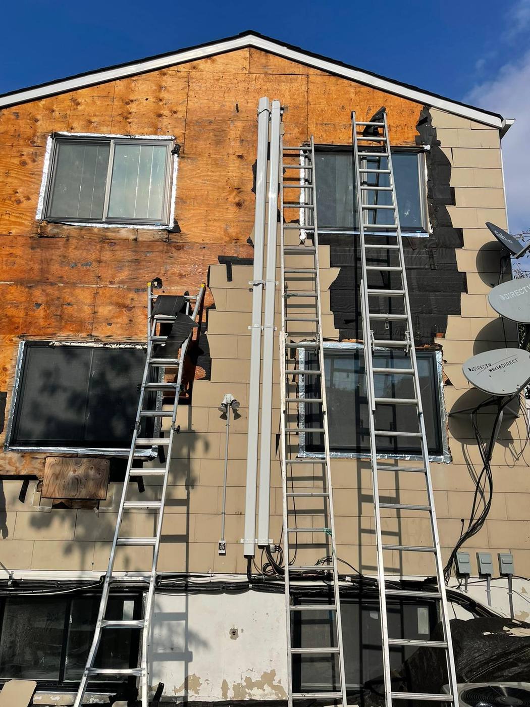 Siding tear-off and installation